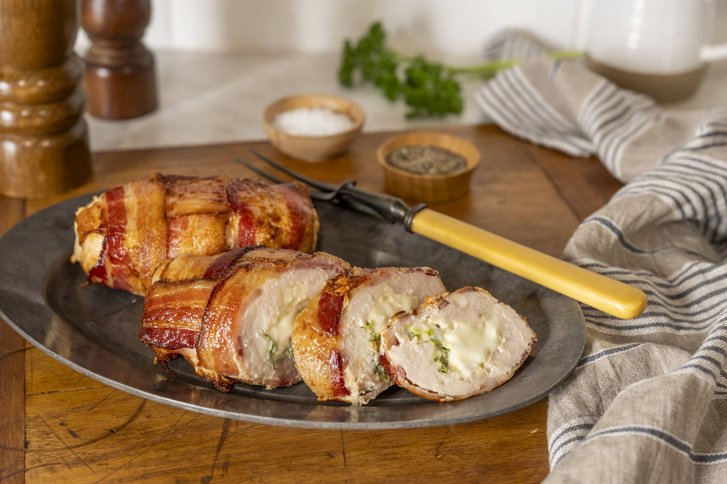 Bacon Wrapped Stuff Pork Loin - Spinach & Garlic Butter