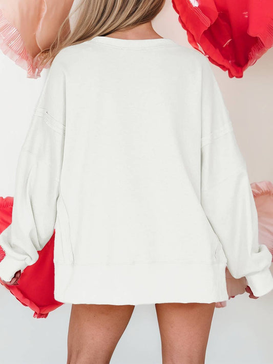 Bow Sequin XOXO Letter Graphic Exposed Seam Baggy Sweatshirt